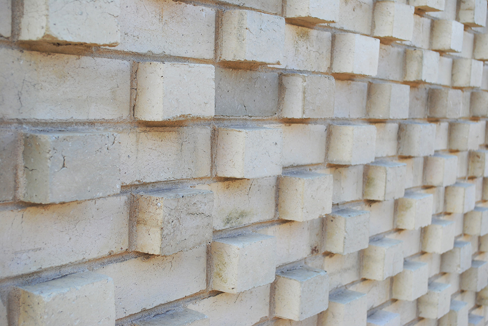 A close up of a brick wall.